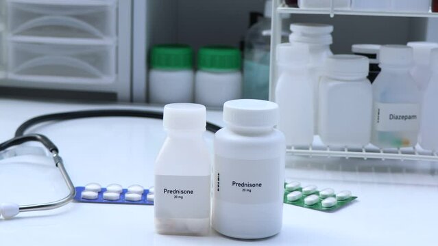 Prednisone pill in white bottle, pill stock, medical or pharmacy concept