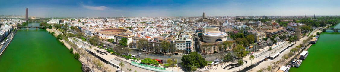 Fototapeta na wymiar Aerial view of Sevilla, Spain. City skyline along the river