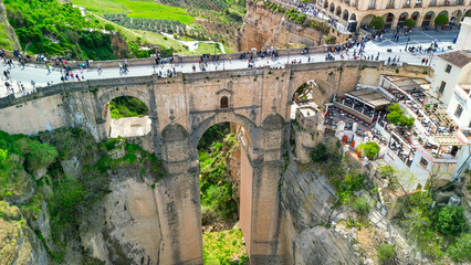 Fototapeta premium Aerial view of Ronda and its medieval bridge. Ronda is the major white town of Andalusia, Spain