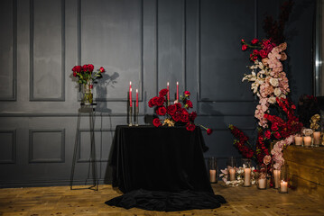 Romantic date. Luxury candlelight dinner table setup for couple on Valentine's day. Table setting...
