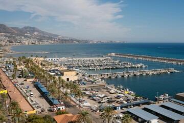 Fototapeta na wymiar the beautiful port of menorca with boats parked nearby