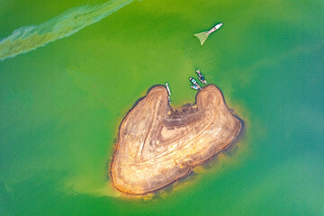 Tri An lake, Dong Nai province, Vietnam in the green algae season has a beautiful green color....