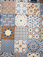 Distinctive and colorful patterns of floor tiles of stores in Thailand.