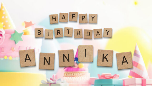 Happy Birthday Annika card with wooden tiles text. Girls birthday card with colorful background.