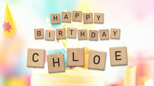 Happy Birthday Chloe card with wooden tiles text. Girls birthday card with colorful background.