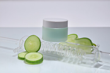 An unlabeled jar placed on a glass condenser with some Cucumber slices arranged around. The natural...