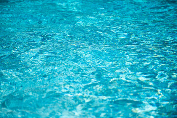 Water in swimming pool, background with high resolution. Wave abstract or rippled water texture.