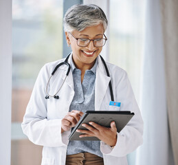 Senior doctor, woman with tablet and digital medical results with hospital schedule and healthcare...