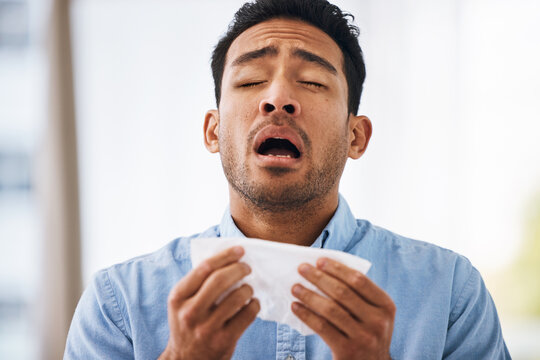 Sick, Sneeze And Man With A Tissue, Allergies And Sickness With Symptoms, Cold And Illness. Male Model, Person And Guy With Congested With Sinuses, Toilet Paper For Nose And Fever With Health Issue