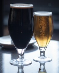 A vertical shot of two different beers