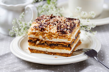 Homemade honey layer cake on the table.