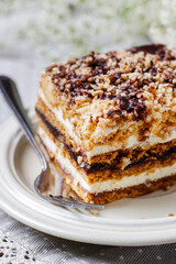 Homemade honey layer cake on the table.