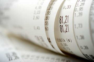 Close-up of supermarket shopping receipts