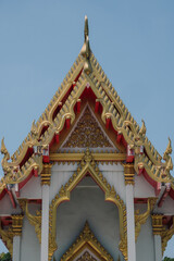 Naklejka premium Buddhism Religion Golden Temple Image Sough-East Asian Praying Statue