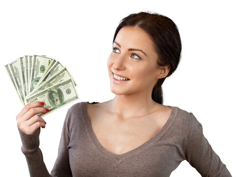 Pretty young business woman holding money isolated on white background