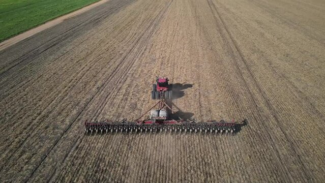 TRACTOR PLANTING SOYBEANS
