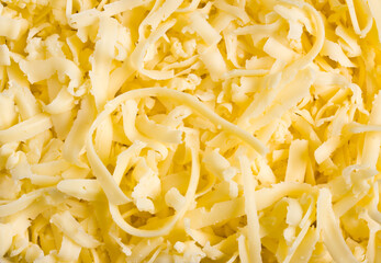 Grated pizza cheese (mozzarella) close up