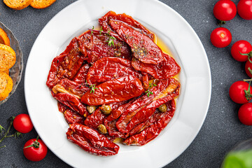 sun dried tomato vegetable appetizer healthy meal food snack on the table copy space food background rustic top view keto or paleo diet veggie vegan or vegetarian food