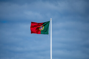 Portugal flag on cloudy sky