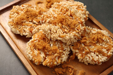 Khaotan - Rice Crispy, a traditional Thai dessert sprinkled with sugar.