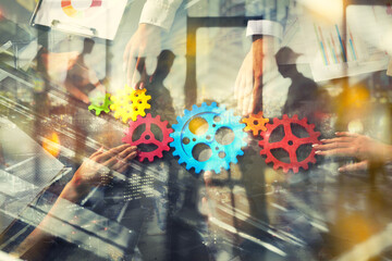 Business team connecting gears. Teamwork, partnership and integration concept. Double exposure