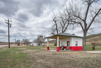 Abandoned gas station beside a highway at Wasta, South Dakota, USA