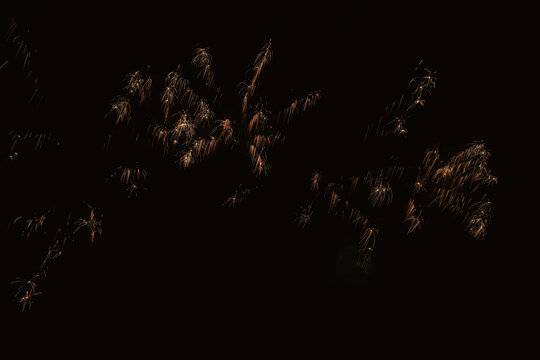 New Year's Night and Diwali HD Colourful Starbursts and Rocket Explosions on a Black Background Sky with Red, Green, Blue, Purple, and Gold Colour Fireworks Bursts with Space for Text&mdash;Smoke-Free