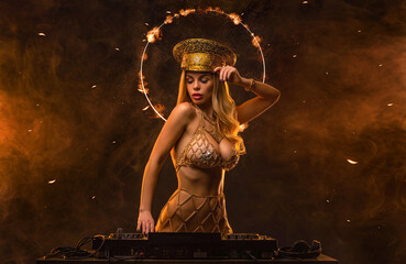 Hot DJ woman. Portrait of sexy TDJ girl at the night club party. Mixtape or book covers - download high resolution picture for your song or music clip.