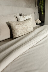 Fototapeta na wymiar Grey sleeping Bedroom with pillows 