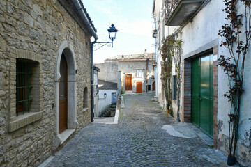 Fototapeta na wymiar A narrow street in Alberona, a town in the province of Foggia in Italy.