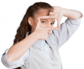 Beautiful young businesswoman making finger picture frame