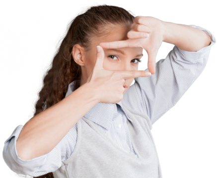 Beautiful young businesswoman making finger picture frame