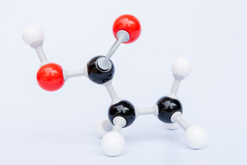 Propanoic acid molecular structure isolated on white background. Chemical formula is C3H6O2., Chemistry molecule model for education on white background