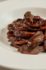 Pasta in wine with duck breast