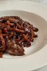 Pasta in wine with duck breast