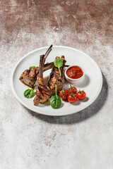 Grilled rack of lamb with vegetables