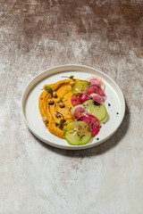 Hummus with pumpkin and radish