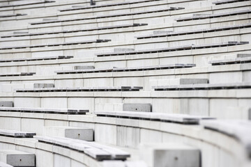 Seating area made of concrete in a large outside venue