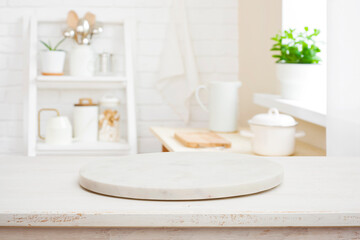 Fototapeta na wymiar Pedestal for product display on wooden desk and kitchen interior