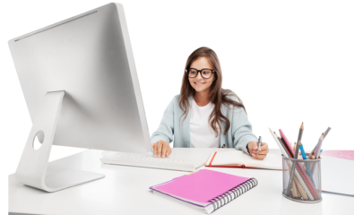 Happy smiling girl student watching learning online video class on a laptop
