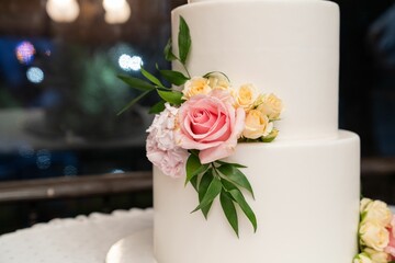 Closeup of a wedding cake on a table