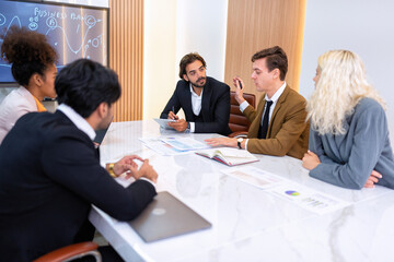Employee on job corporate Business colleagues sit around table work as team and hand gathering