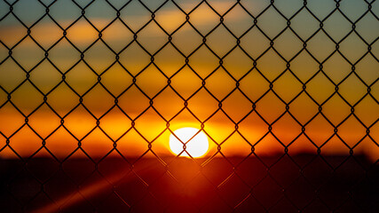 metal fence sunrise/sunset, Airport 