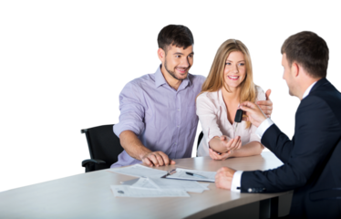 Happy couple with car dealer in auto show or salon