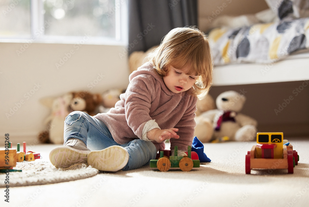 Canvas Prints Playtime is her favourite time. a little girl playing at home.