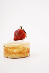 portion of foot with strawberry on white background