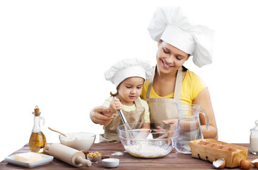 The beautiful young mother and her little daughter cooking