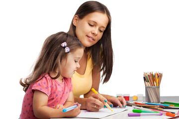 Happy mother and daughter painting