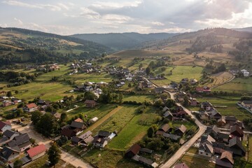 Aerial landscape over a village with lands