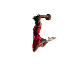 Isolated basketball  player jumping to make a basket